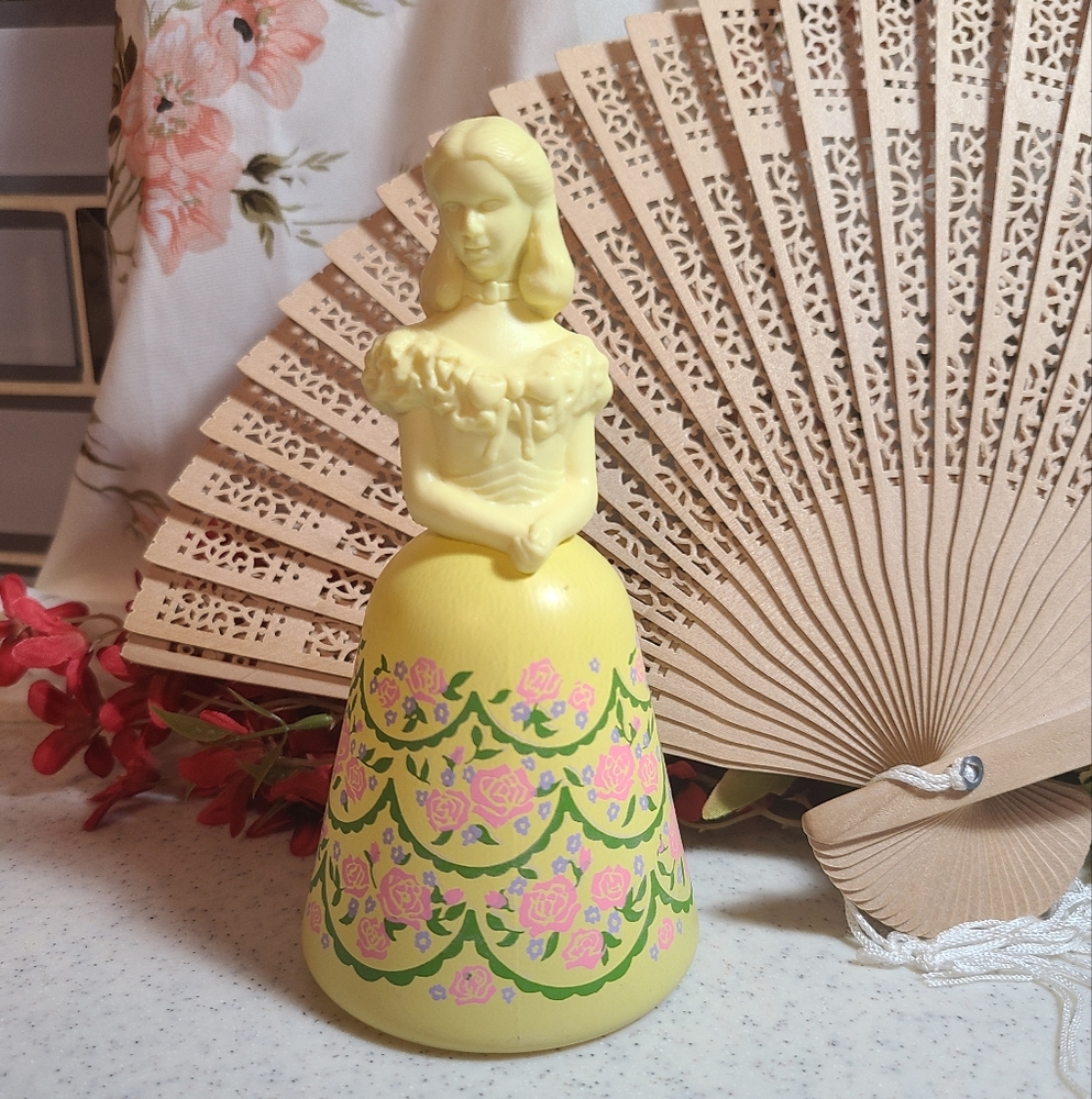 Vintage Yellow Figurine with Floral Design collectible empty avon bottle